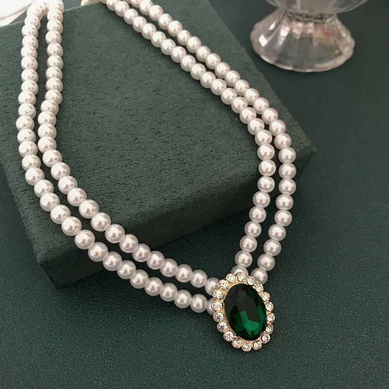 Regal Pearl Necklace – Double Strand with Emerald Halo Pendant